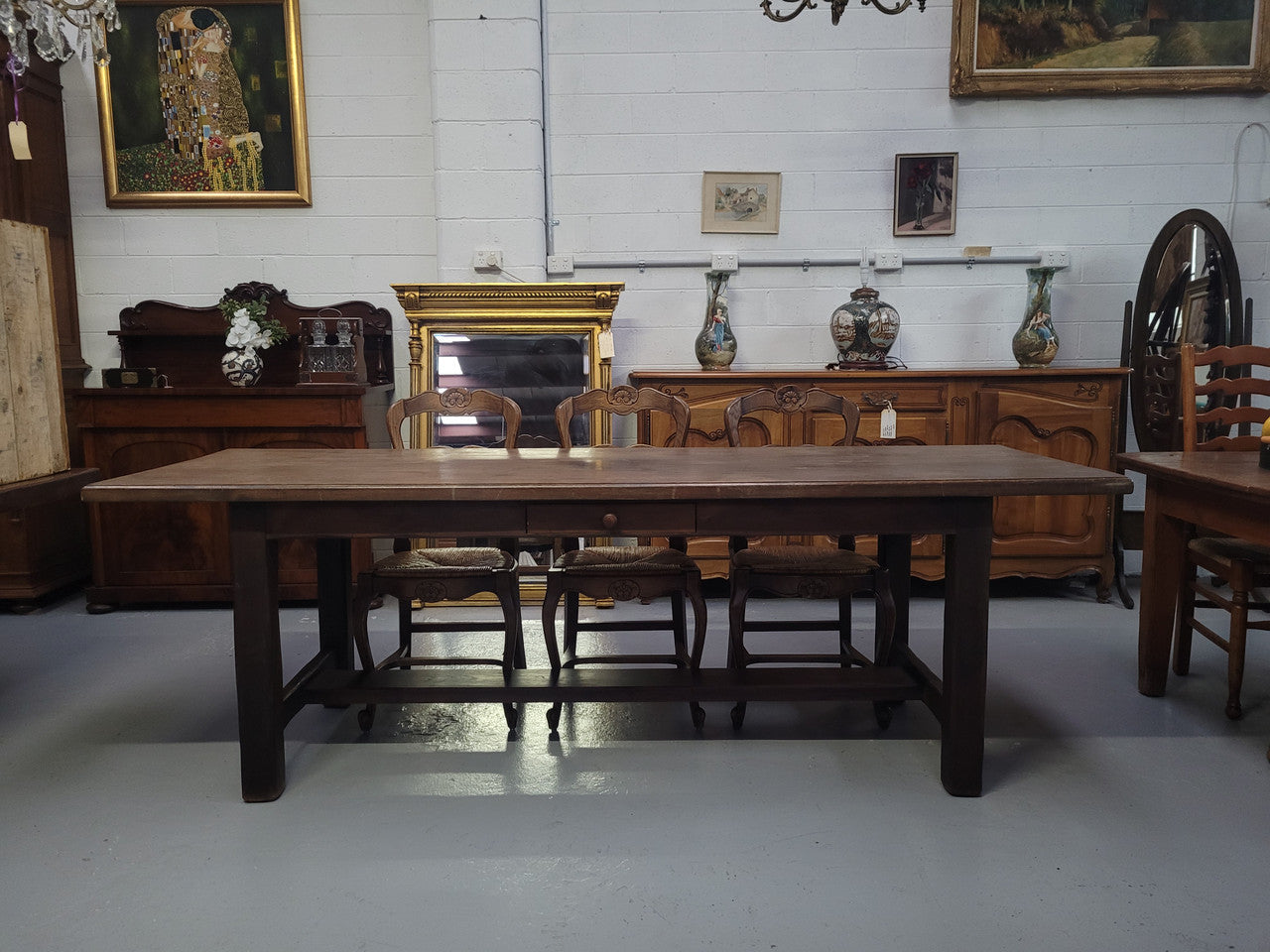 Antique French Oak single drawer pedestal base farmhouse table. The table top is in original condition and can be kept the way it is for a rustic look or finished for a completely different look. It has been sourced from France and is in original condition.