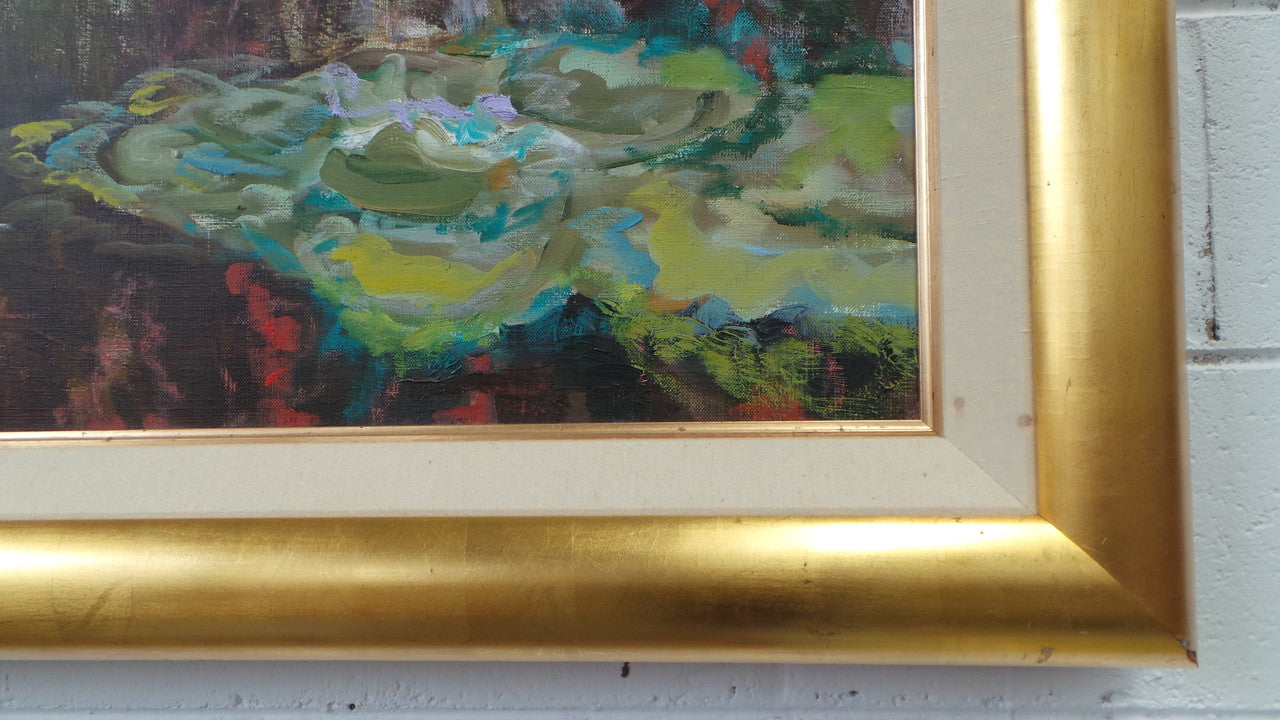 A beautiful Framed oil on canvas in vibrant colours and framed in a lovely gold frame. This piece is signed by artist John Cumming from "The Mill Gallery" and still has its original gallery card as shown in picture. It is in good original condition.