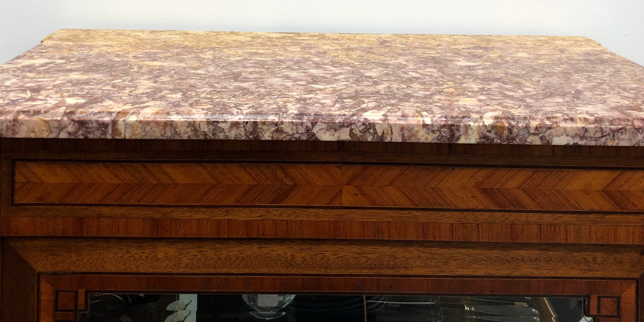 Beautiful French walnut and parquetry inlaid vitrine with lovely bevelled glass and a marble top. It comes with four glass shelves which are adjustable and it is in good original condition.