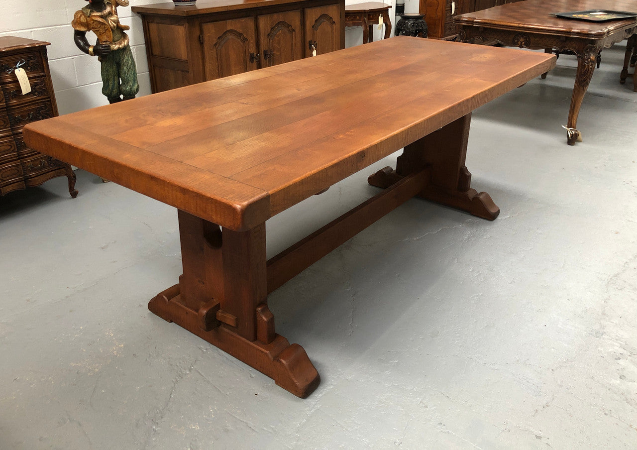 Lovely Oak French Farmhouse table with a thick plank top and lovely stretcher base. Can comfortable seat 8-10 people and is in good original detailed condition.