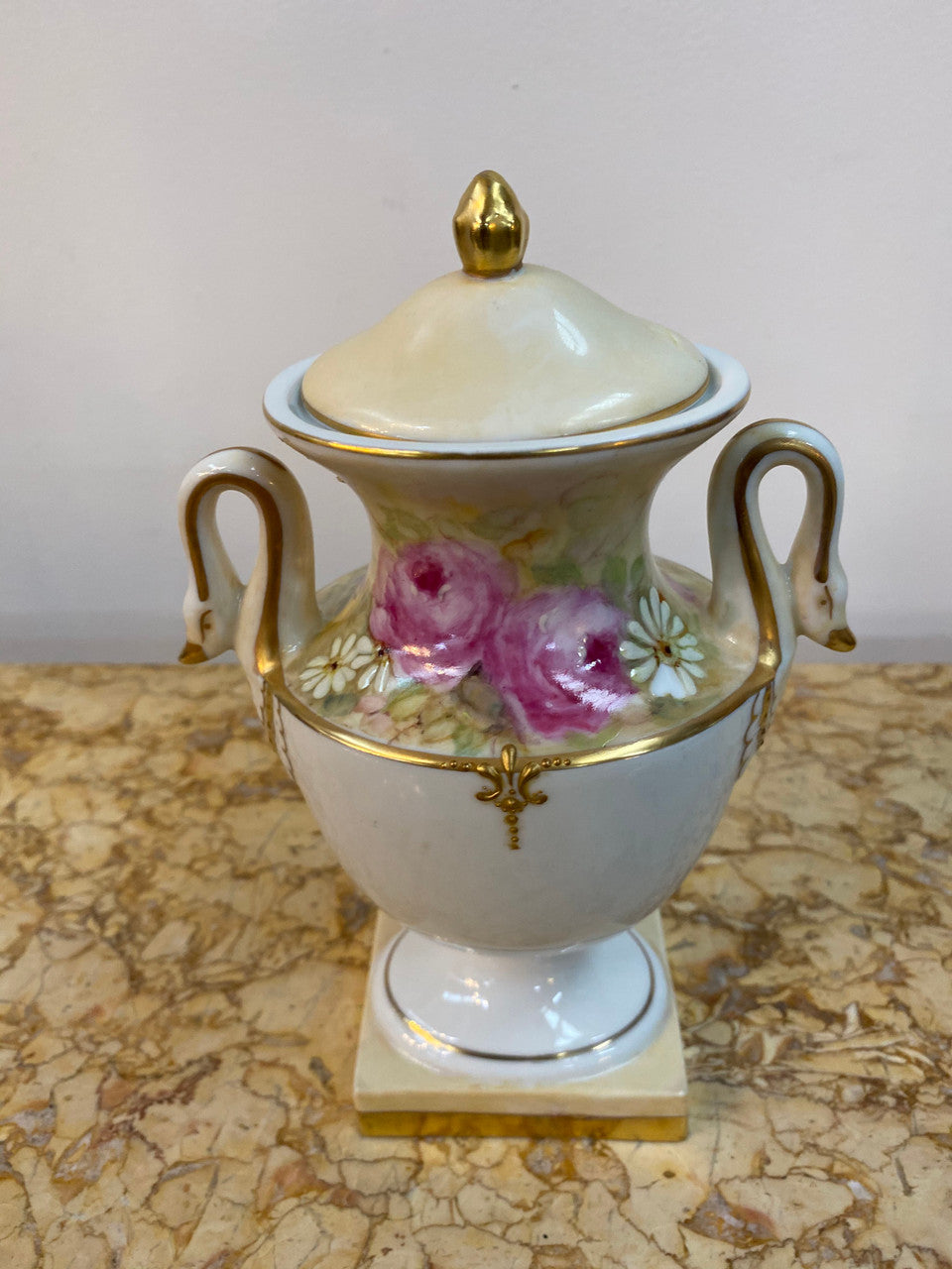 SIgned hand painted Portugal china lidded urn vase with swan handles.