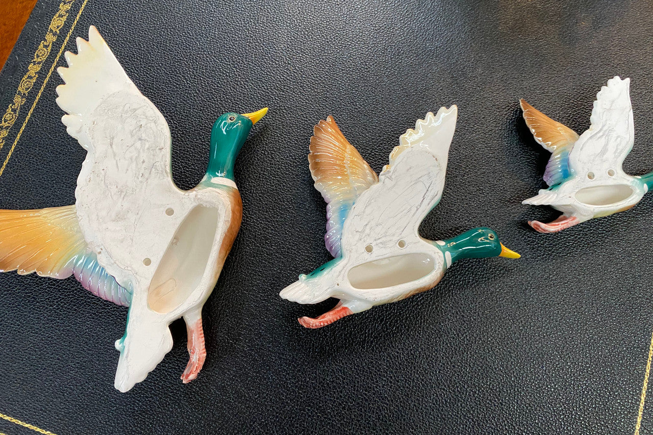 Set of three vintage flying duck wall ornaments. Measurements are for largest duck.