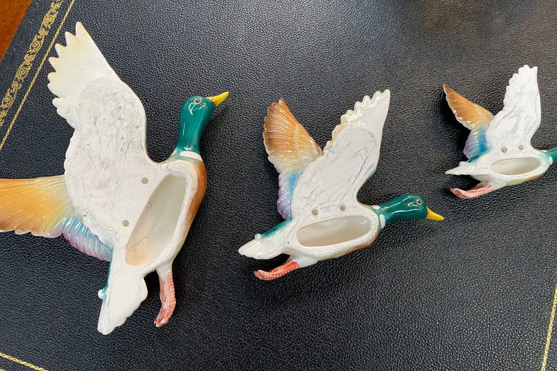 Set of three vintage flying duck wall ornaments. Measurements are for largest duck.