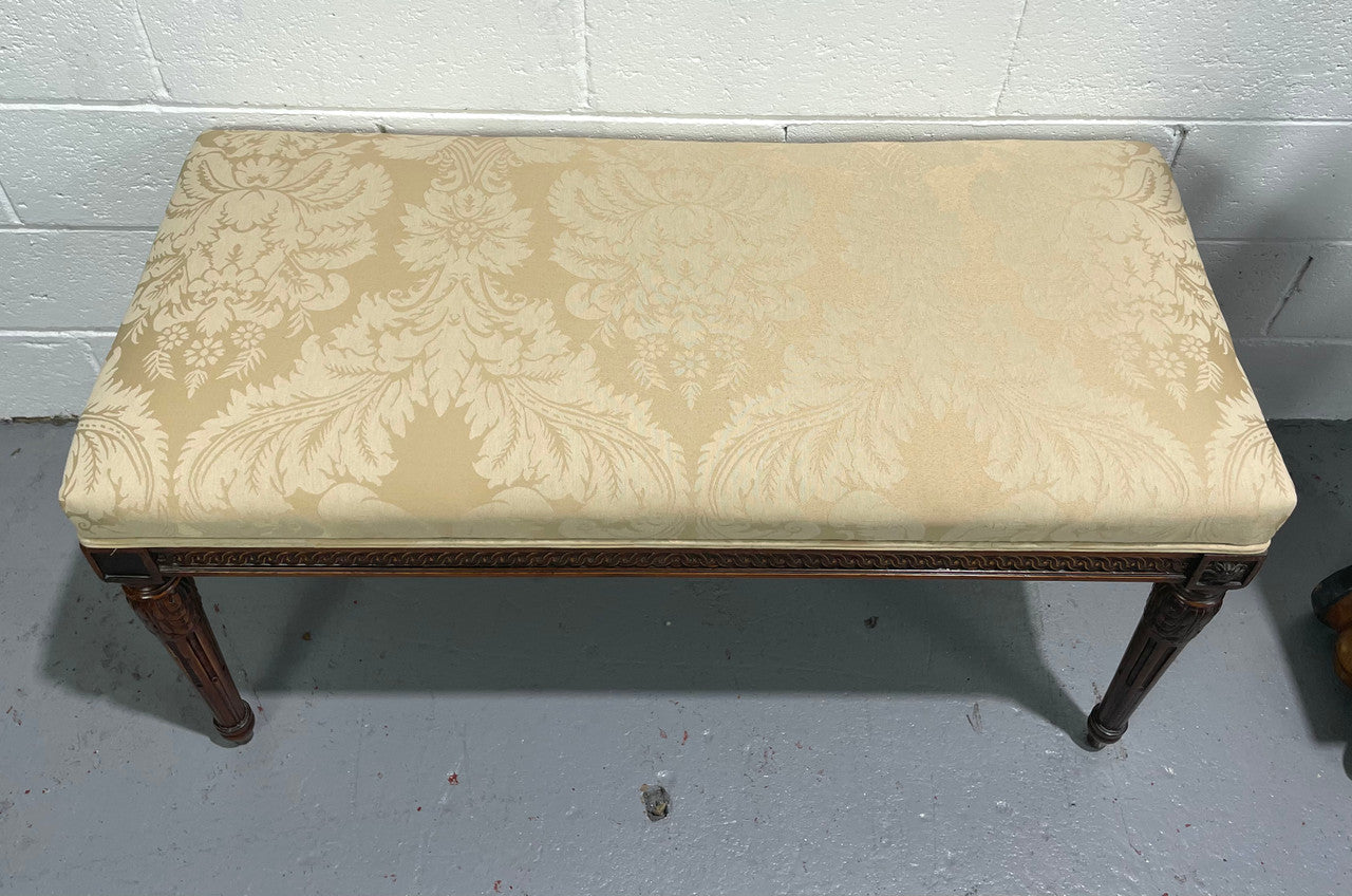 Nicely carved French Louis XVI style Walnut upholstered stool. The stool is in good condition and the frabic is in good used condition, please view photos as they help form part of the description.