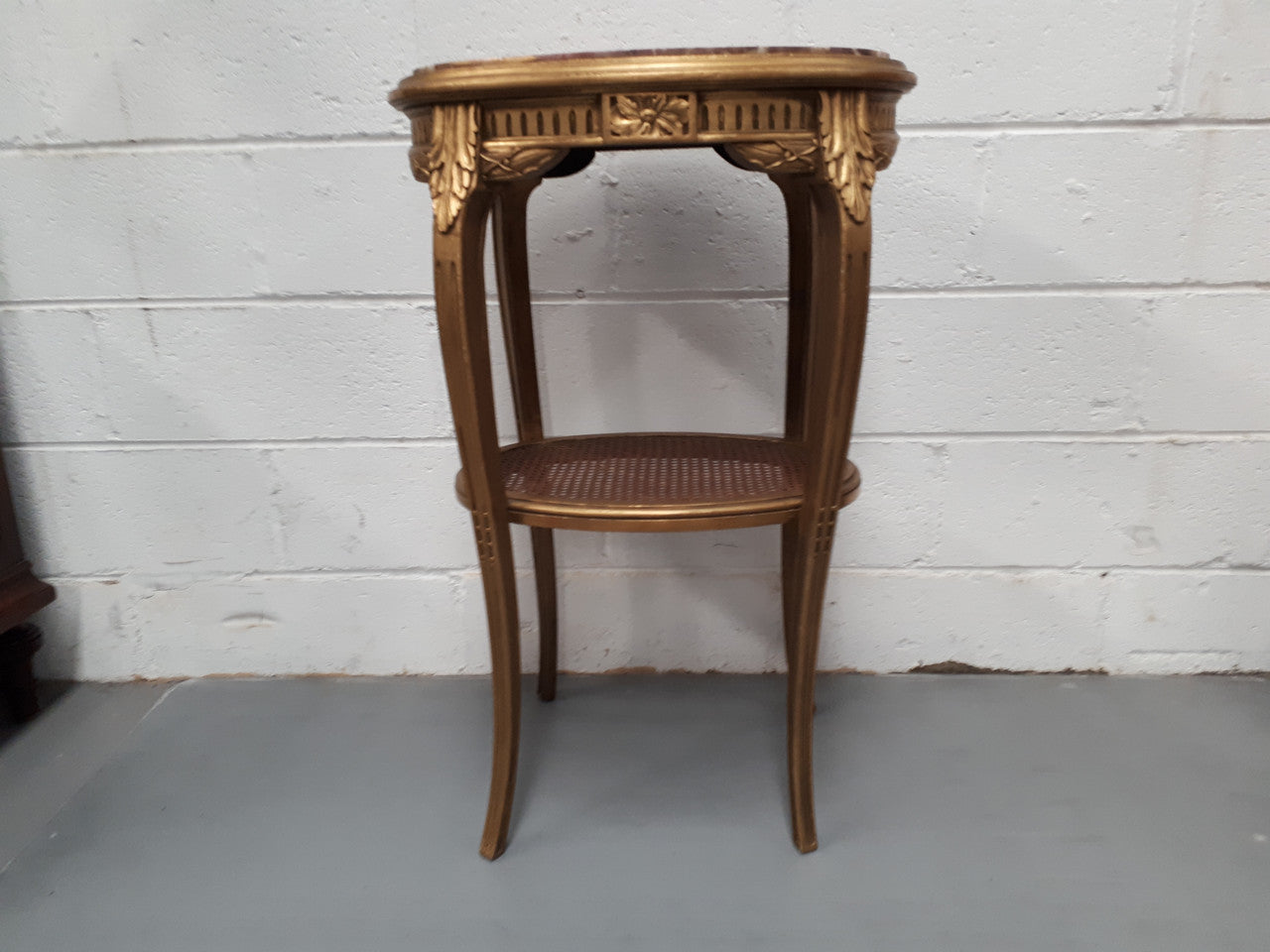 An exceptional & rare 18th century Louis XVI oval inset marble top & giltwood side table with original water gilding. In good restored condition. Circa 1790.