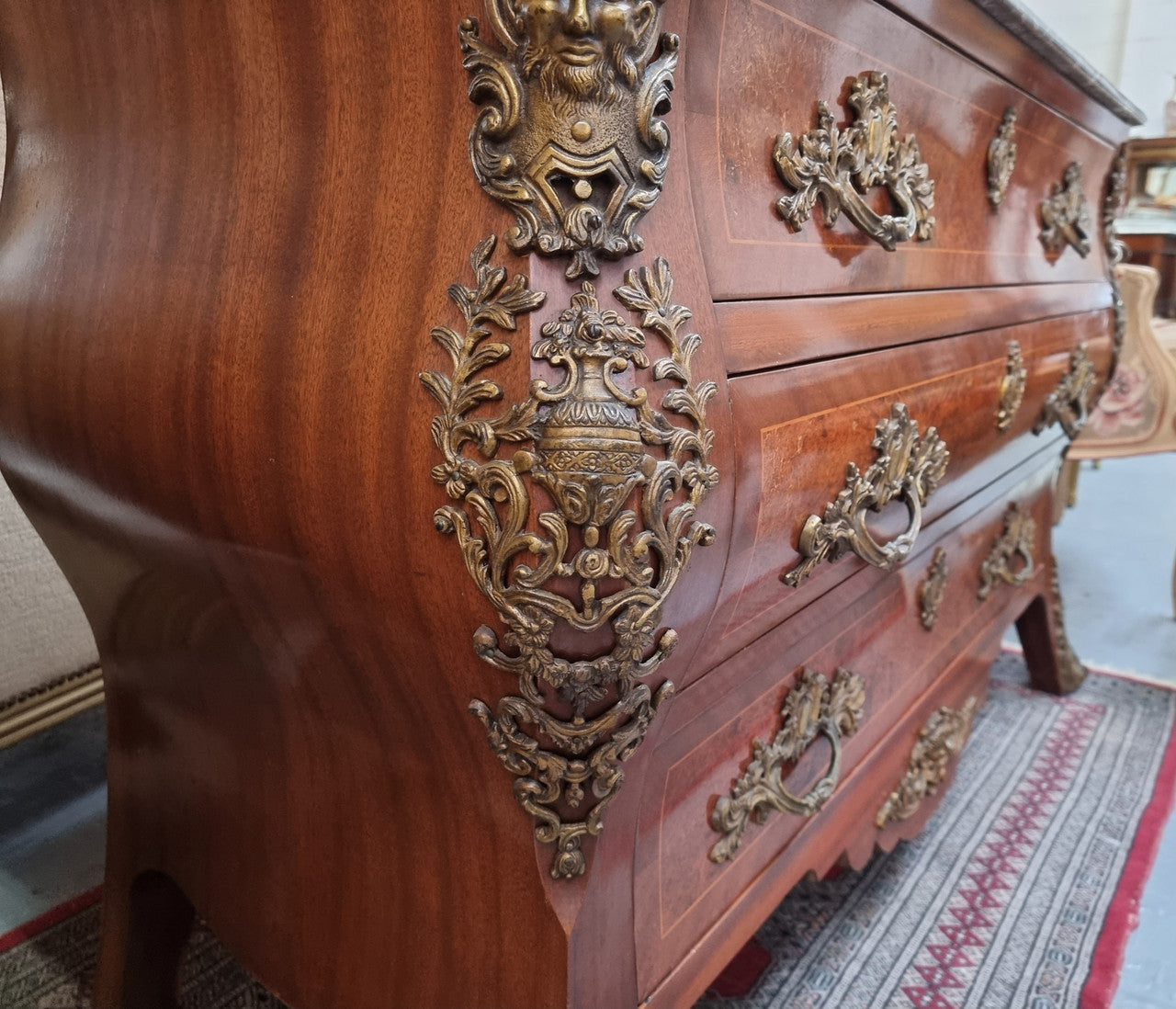 French Louis XVI style three drawer commode with amazing coloured marble. It has decorative brass mounts and is in very good original detailed condition.