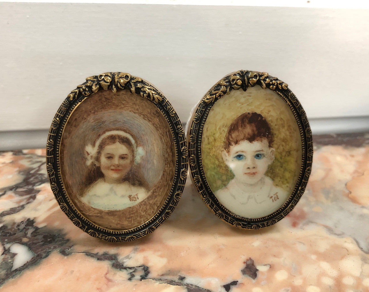 A pair of hand painted & signed miniatures in frames. They both still contain original stickers on back of frames "Danish Design" and are in amazing original condition.