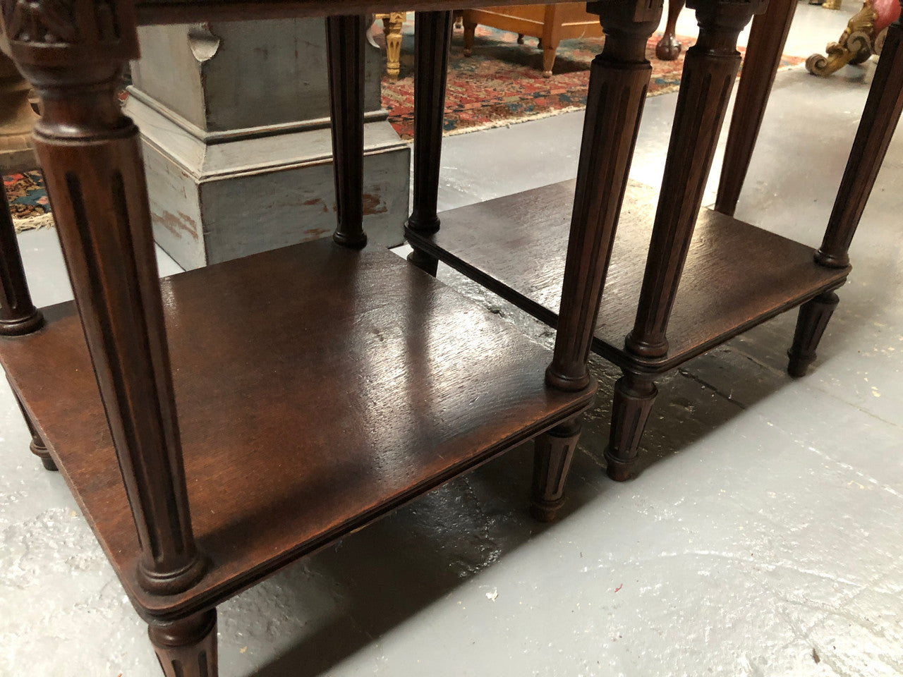 Lovely pair of French Oak Louis XVI style bedside cabinets with inset marble tops a drawer and a cupboard for storage. In good original detailed condition.