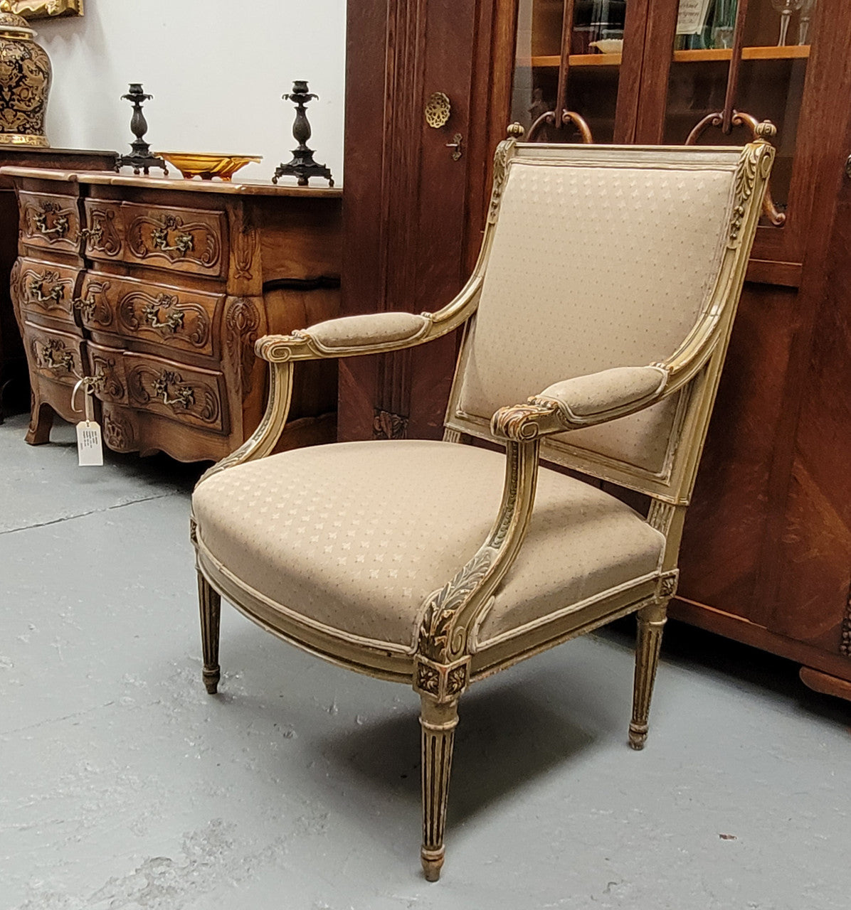 Louis XV style painted Fauteuil chair with attractive fabric upholstery. It has been sourced from France and is in good original detailed condition. The upholstery is in very good used condition, please view photos as they help for part of the description.