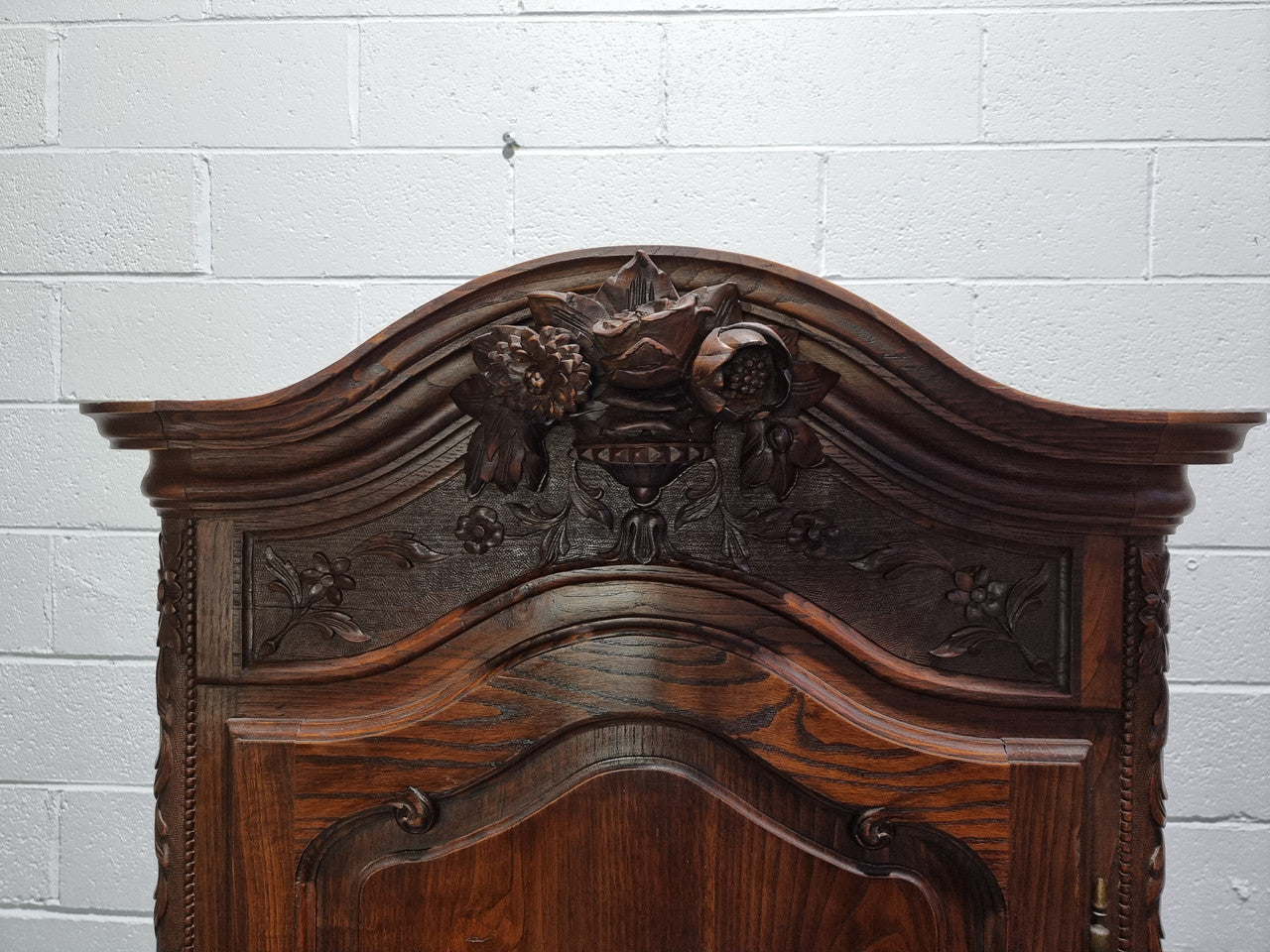 French Oak "Bonnetiere" cupboard of pleasing small proportions. It has four adjustable shelves and plenty of storage space