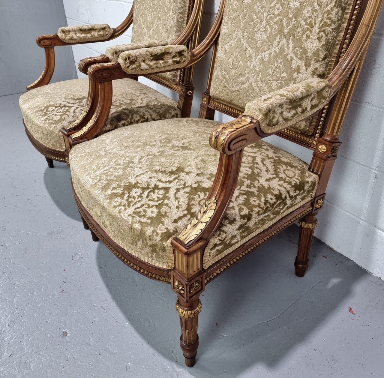 Beautiful French walnut Louis XVI style upholstered three piece Salon Suite. It has lovely fabric which is in overall good condition and is very comfortable to sit in. In good original detailed condition.