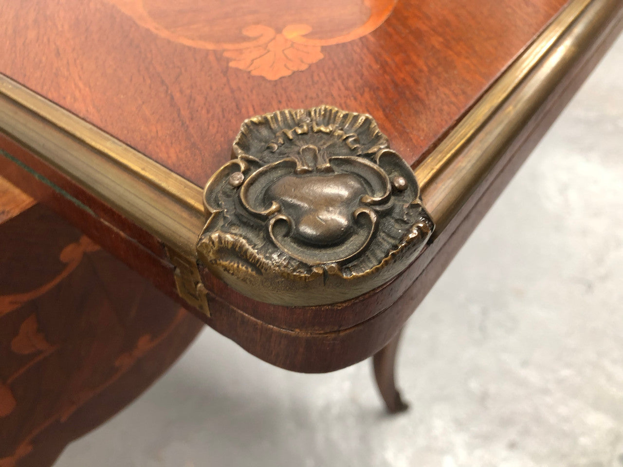 Beautiful french inlaid games table which includes internal drawers and bronze mounts. Internal drawers have counters and cards included.