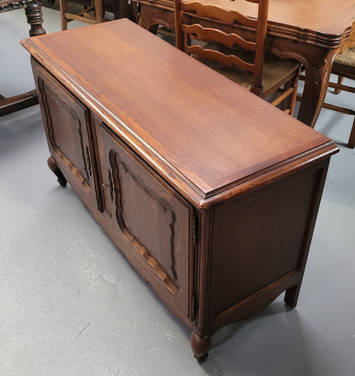 A hard to find Louis XV style French two door cabinet which would make an ideal TV cabinet. It has been sourced from France and in good original detailed condition.