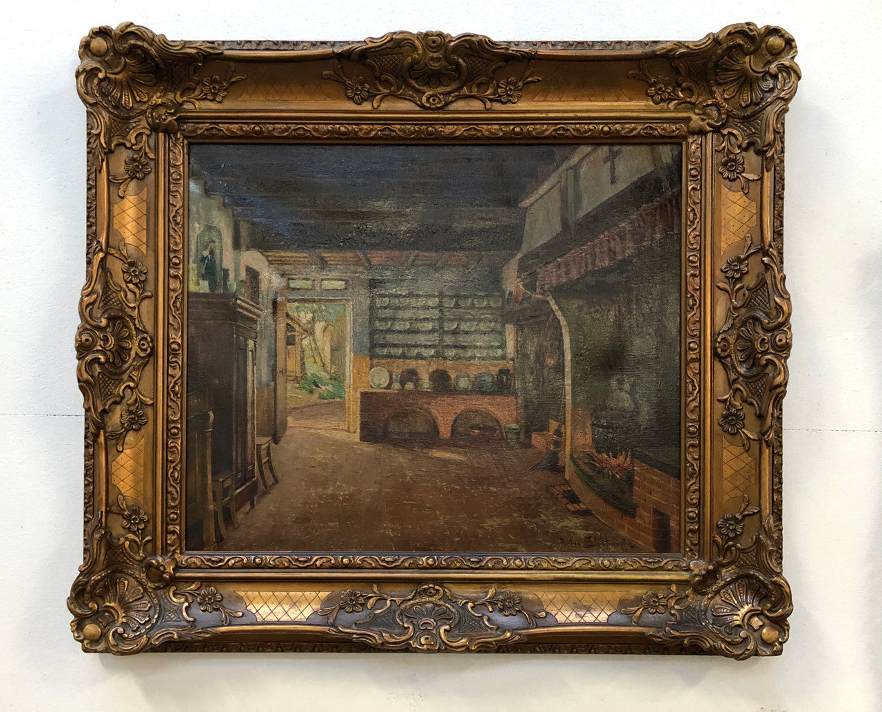 Antique French gilt framed signed oil on canvas of an interior scene in good original condition.
