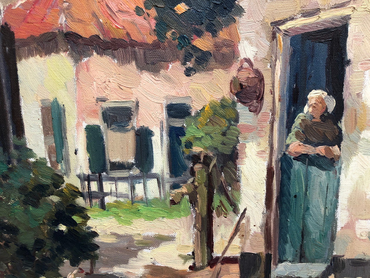 Pair of Vintage framed French oil on canvas of "Village Scenes". They are both in good original detailed condition.