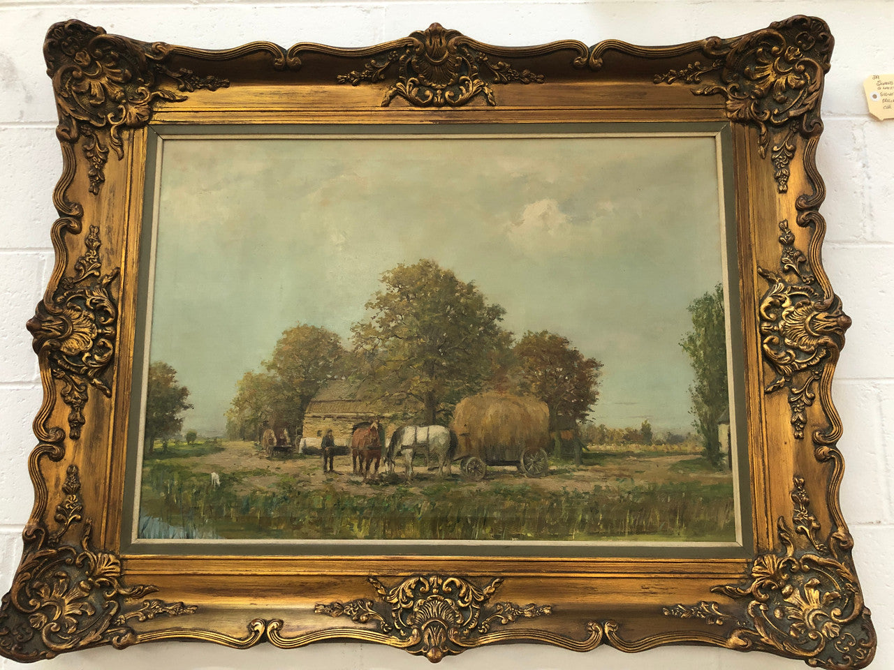 French oil on canvas of a beautiful farm scene in a lovely ornate frame, and in good original condition.