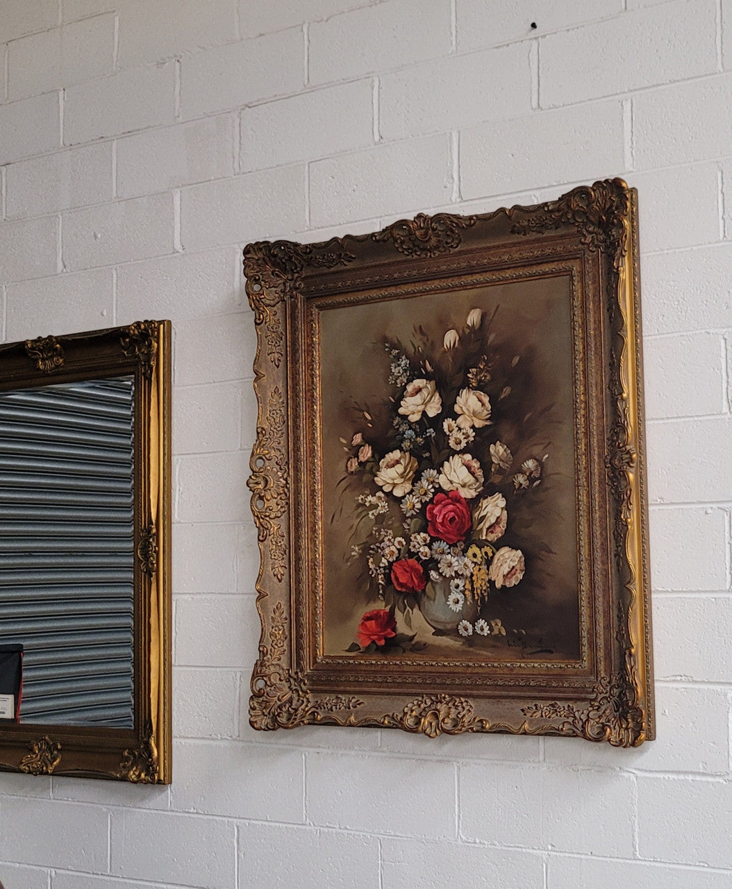 Attractive French floral oil on canvas - signed. Mounted in a stunning patterned gilded frame. It is in good original detailed condition.
