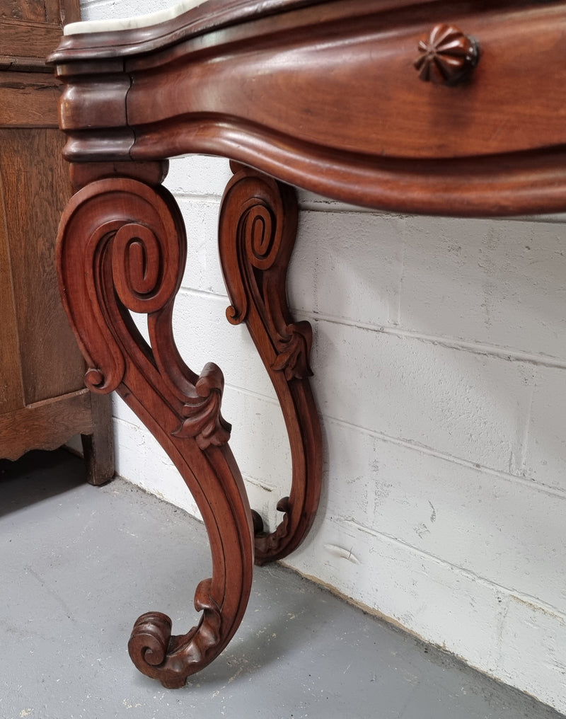 19th Century French Mahogany marble top console table. Louis XV style with white marble top and single drawer. Sourced from France and in good original detailed condition.