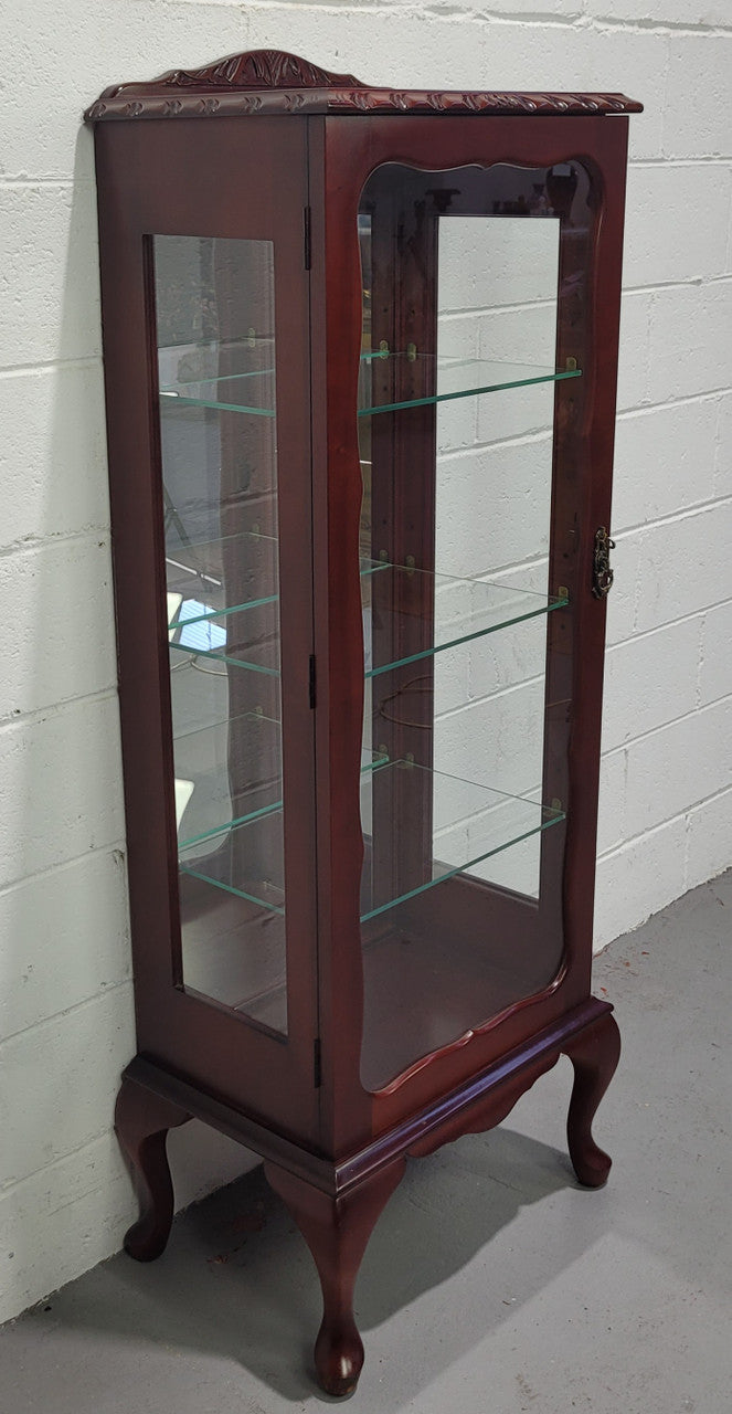 Vintage Mahogany petite display cabinet with three solid glass shelves. Ideal for a small area and is in good original detailed condition.