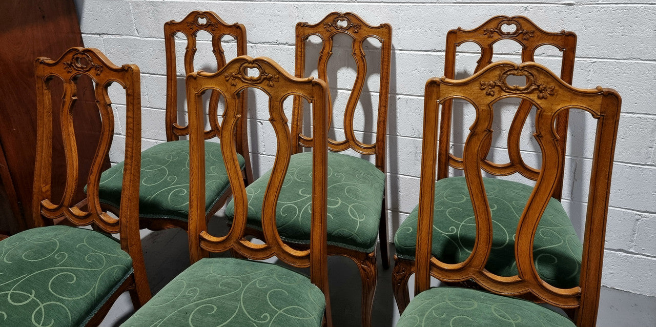 Set of six French style Oak decorative upholstered seat dining chairs. They are comfortable to sit in and are in good original condition, please view photos of fabric as the fabric is in good used condition.