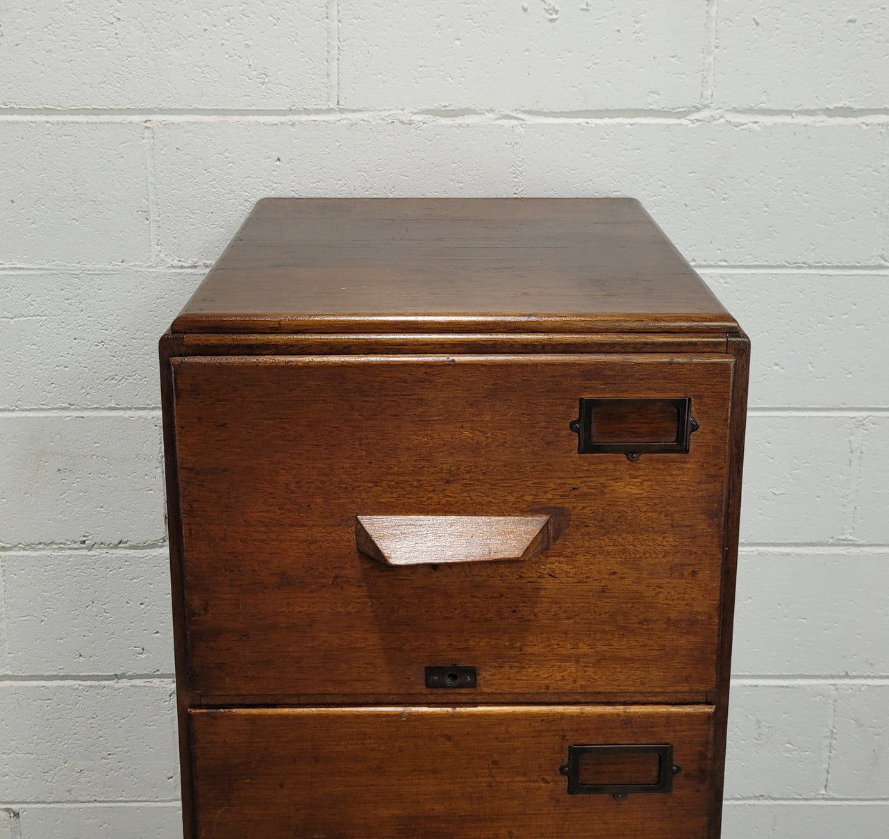 Blackwood four drawer filing cabinet in good original detailed condition.