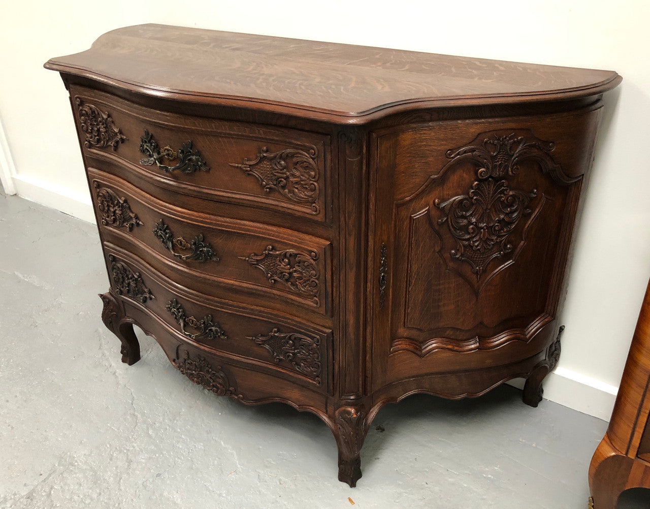 French Louis XV style dark Oak carved, two door and three drawer Commode /side cabinet. Could also be used as a TV cabinet or in the bedroom as storage very versatile. In good original detailed condition.