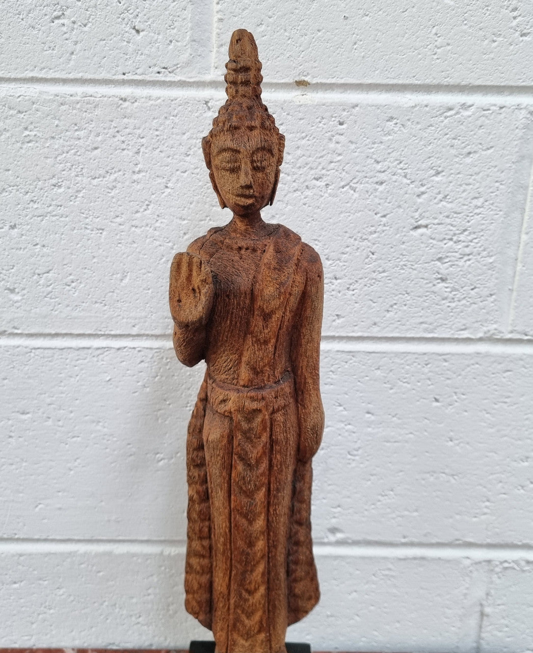 Antique Sukhothai Style Thai carving of a standing Buddha. In good original detailed condition.