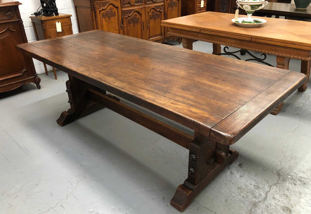 French Oak stretcher base Farmhouse dining table. In good original detailed condition.