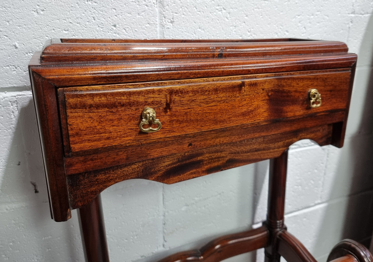 Very useful reproduction Mahogany valet stand in good condition.