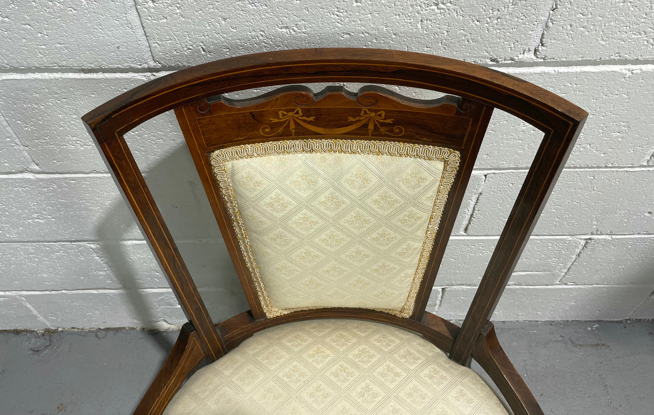 Edwardian Sheraton Inlaid upholstered round bedroom chair. In good original condition and the fabric is in used condition, please view photos as thy help form part of the description.