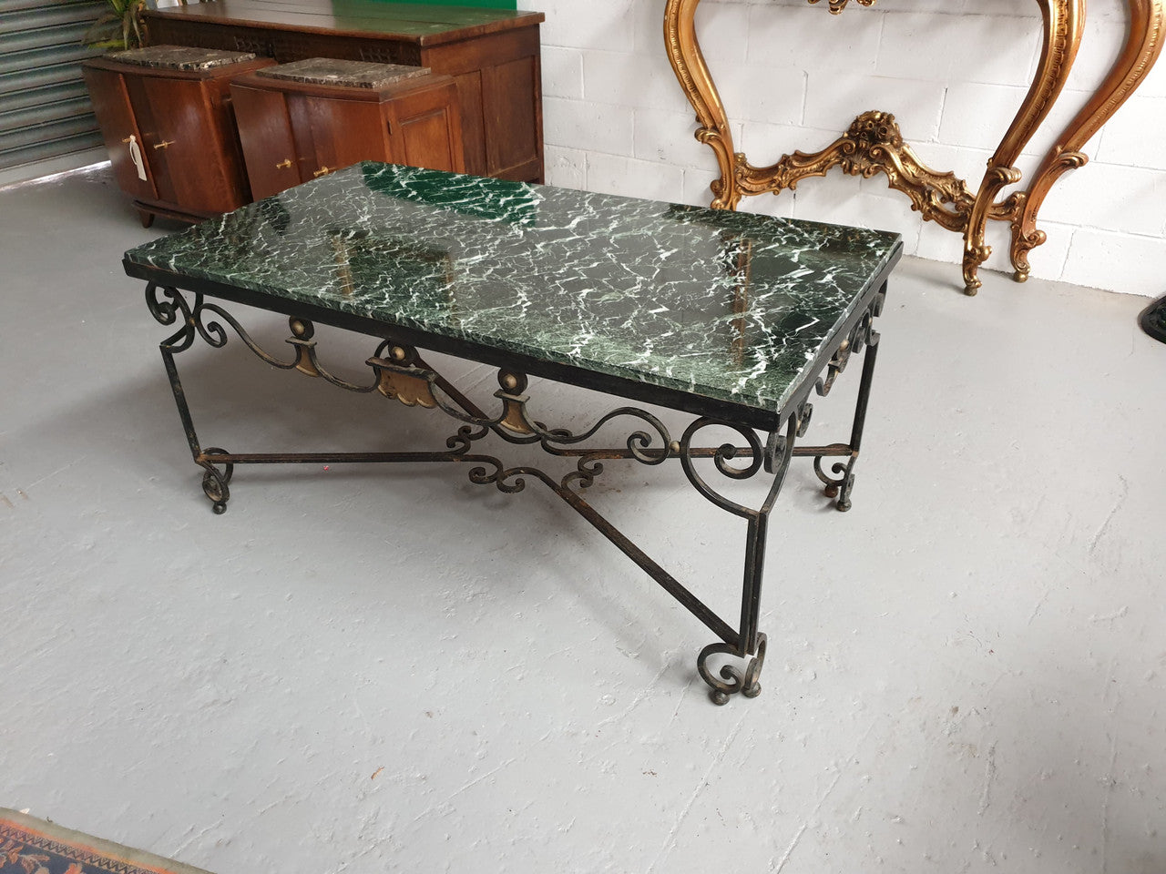 Wrought iron Coffee Table With An Attractive Green Marble Top