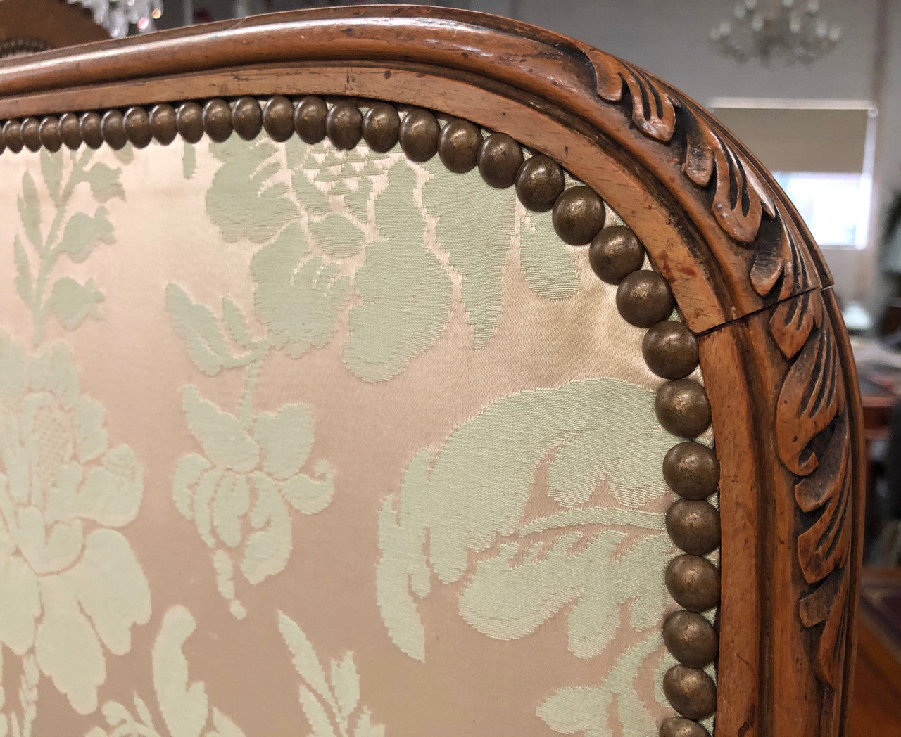 An antique French Walnut louis XVI style 3 fold screen/divider. Upholstered with beautiful pink silk brocade fabric. The fabric is in good overall condition with some minor wear and tear which is expected for its age. It has been sourced directly from France. Please view photos as they help to form part of the description and condition.