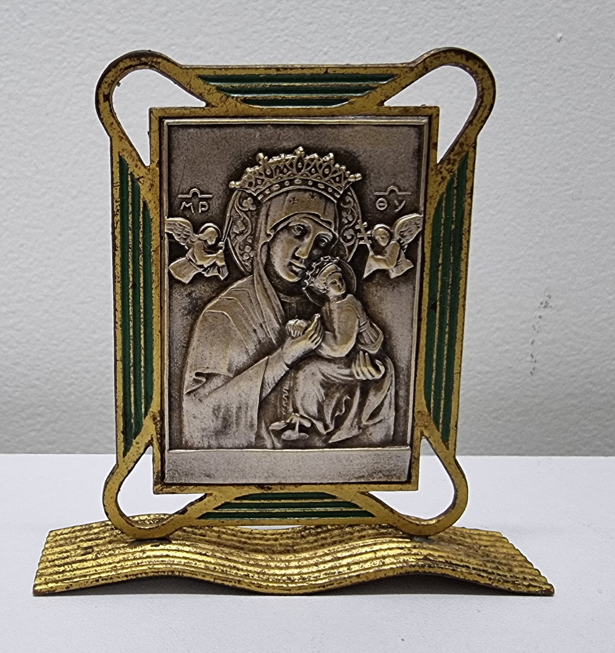 Art Deco silver, gilt brass and enamel religious icon. It has been sourced locally and is in good original condition. Please see pictures as they help form part of the description.