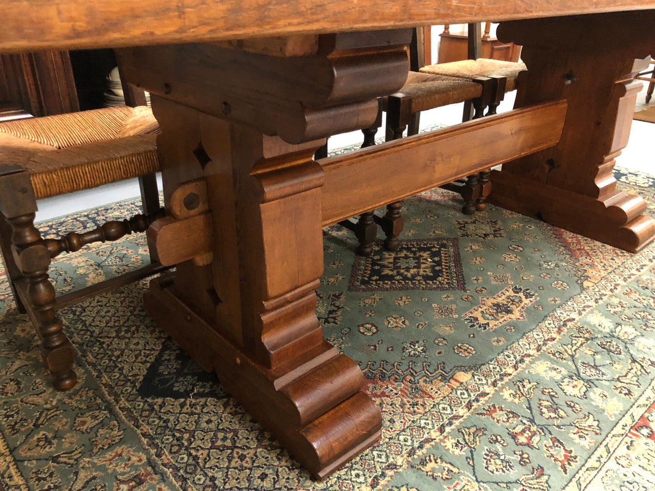 French Farmhouse table with a beautiful thick plank top and stretcher base. Can seat 8-10 people comfortably and is in good original detailed condition.