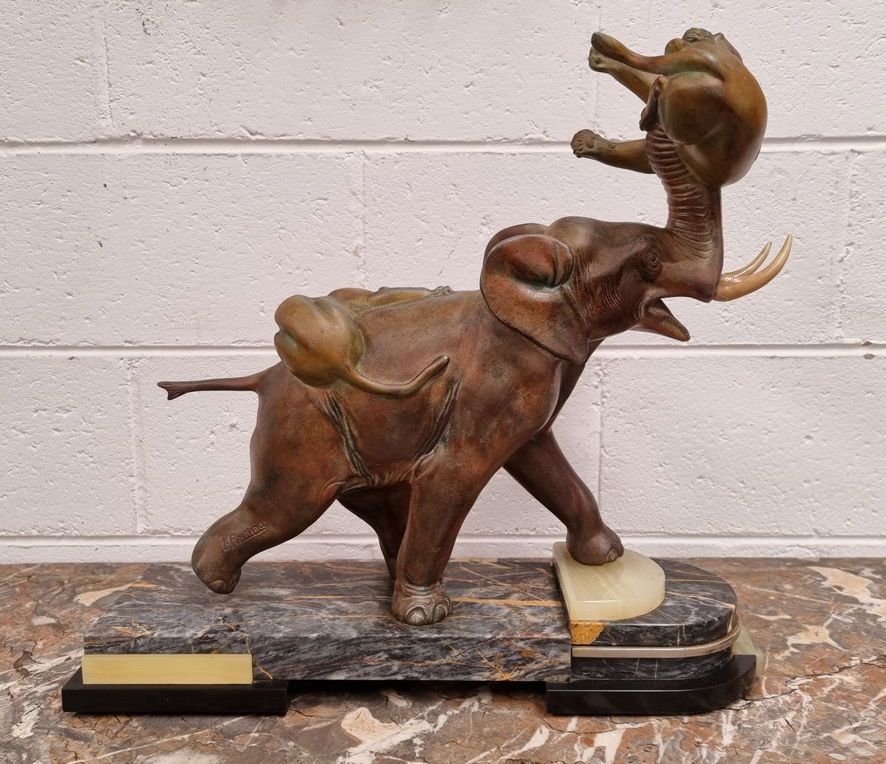 "Irenee Rochard" Art Deco Elephant and Panther statue on a beautiful marble base. Signed on the Elephants leg and sourced from France. It is in good original detailed condition.