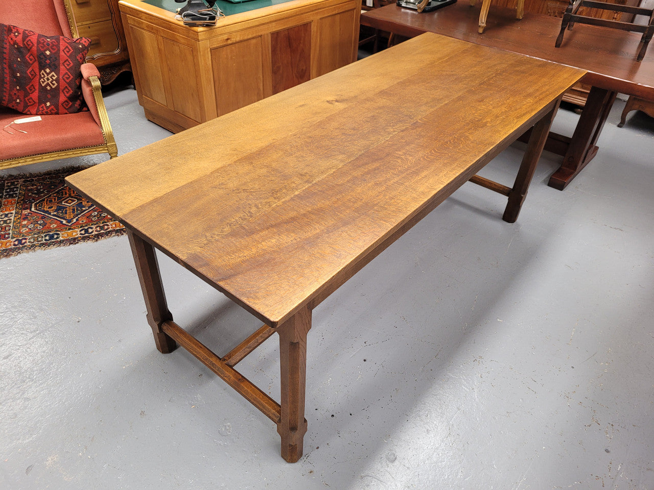 Stunning French oak stretcher base table, that has been sourced from France. It is in good original condition. Please see pictures to form part of the description.