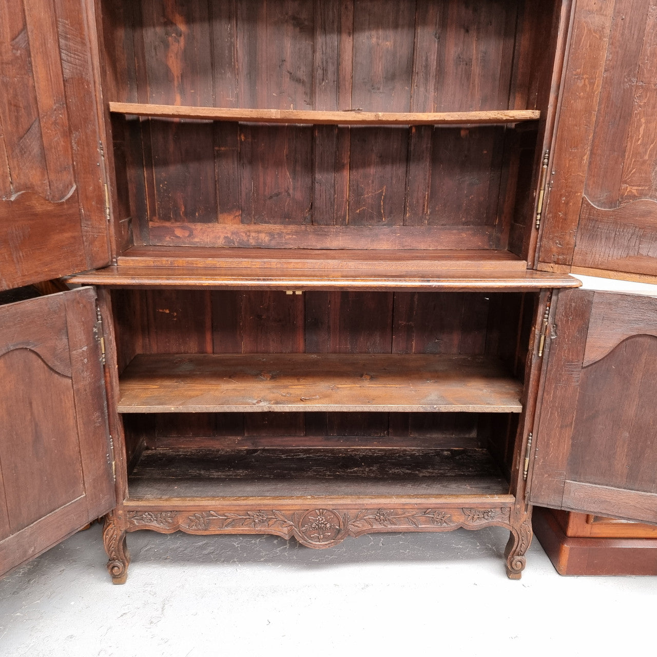French Oak 18th Century superbly carved sideboard buffet. This amazing buffet has loads of character which is expected being circa 1790's. The top section has two fixed shelves and the bottom section has one fixed shelf. It has been sourced from France and is in good original detailed condition.