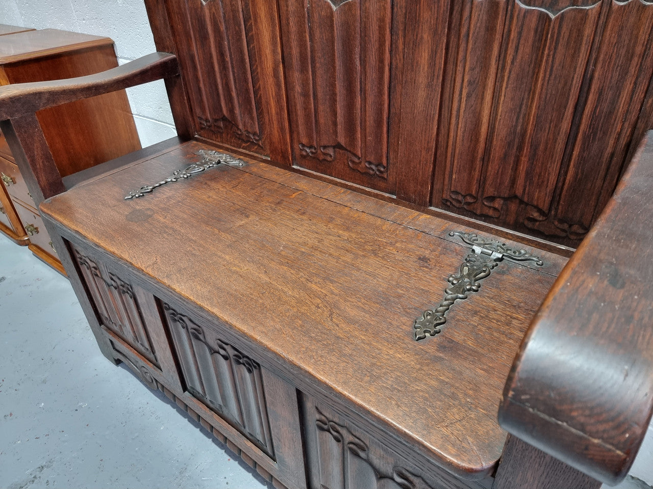 Decorative and nicely carved French Oak 19th Century hall seat with lift up lid for storage. Beautiful details and in good original detailed condition.