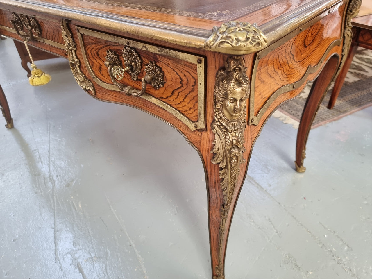 Beautifully fully restored French Antique Rosewood partners desk with beautiful ormolu detail and lovely tooled new leather top. There are three functioning drawers on one side for all your storage needs.