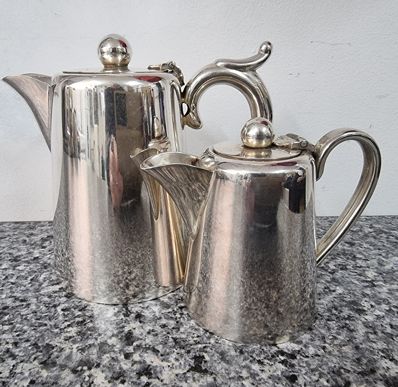 Pair of Vintage Silver-Plate water and milk jug. In good condition please view photos as they help form part of the description.