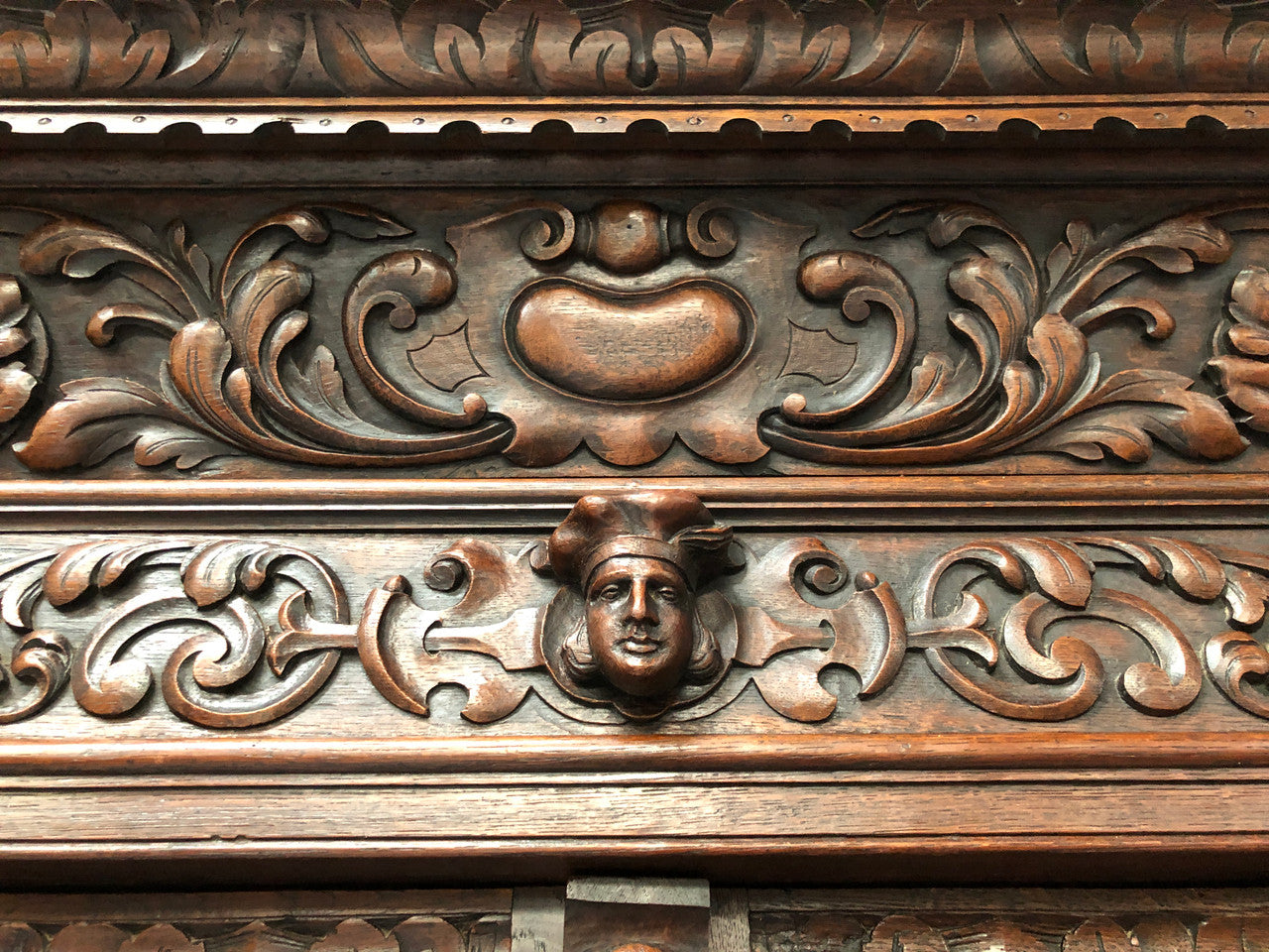 Amazing dark Oak heavily carved Gothic style bookcase with lovely details and adjustable shelves in good original detailed condition. The doors currently have no glass which can easily be added or be left with open shelves.