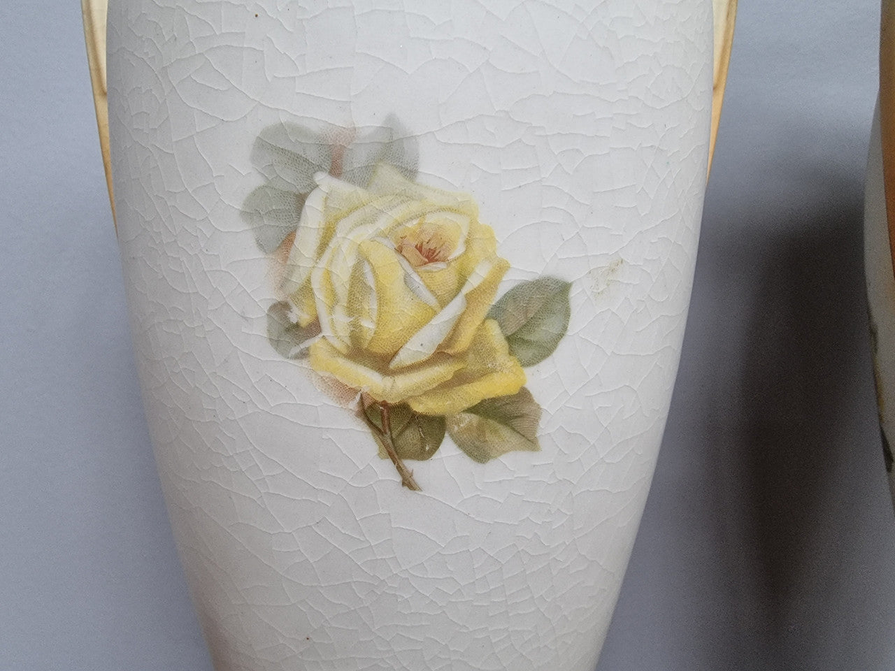Lovely pair of Edwardian floral vases from Austria with beautiful roses on them in good original condition. Some crazing throughout please view photos as they help form past of the description.