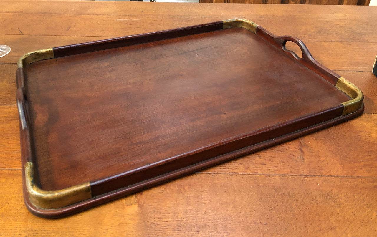 Beautiful Edwardian Mahogany and brass bound tray in good original detailed condition.