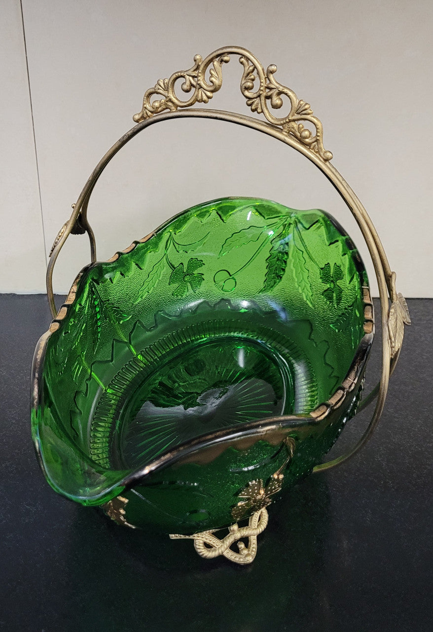 Victorian emerald green and gilt decorated glass bowl with ornate gilt metal stand. It is in good original condition, please view photos as they help form part of the description.