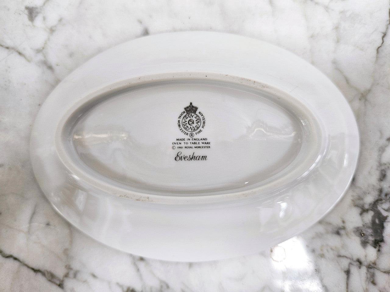 Royal Worcester "Evesham" Pattern small Jug and Saucer. Good Condition no cracks or chips. Please see photos as they form part of the description.