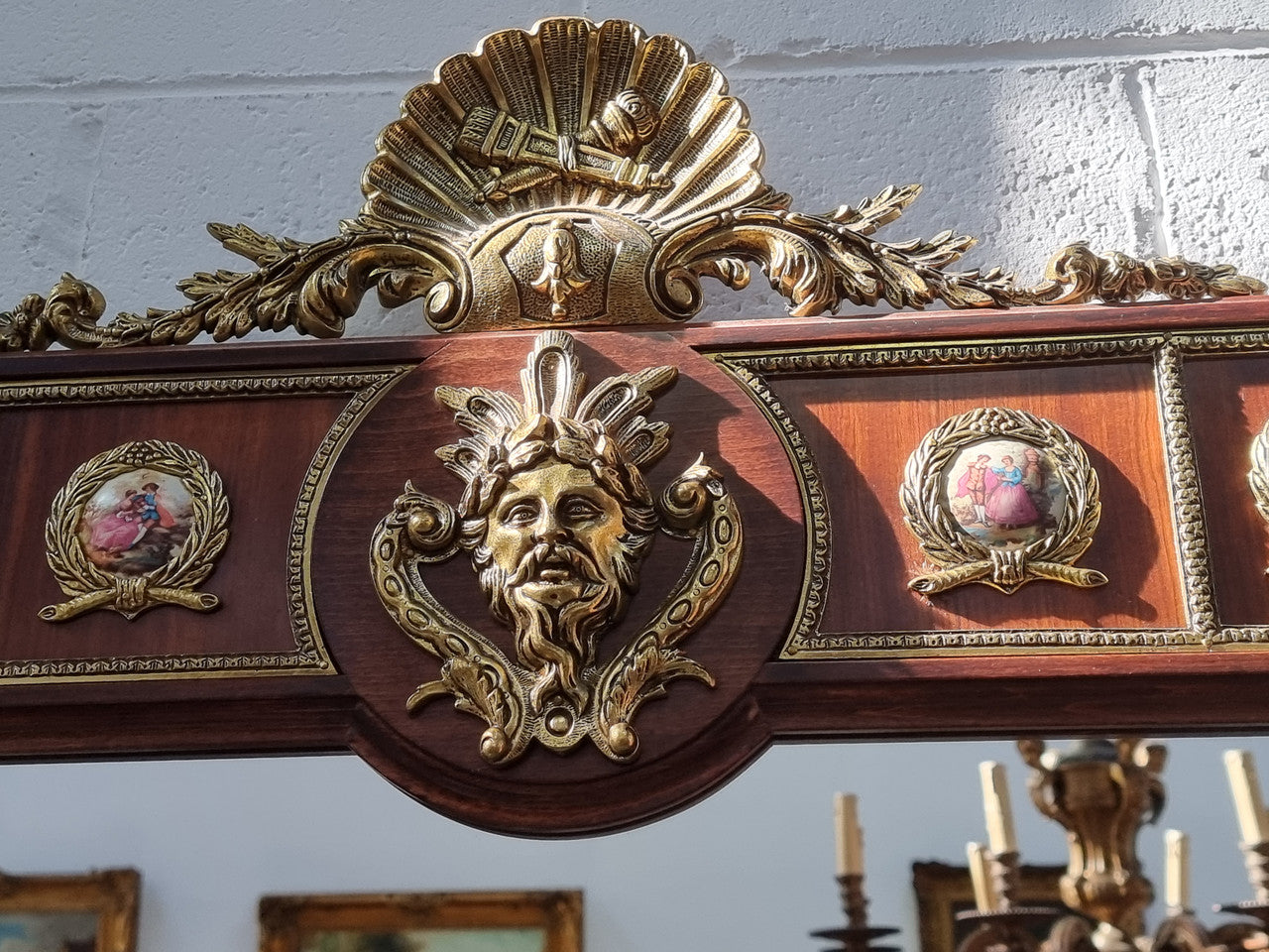 Vintage Mahogany marble top console table with matching mirror. Both with inset limoge panels surrounded by gilt brass. Highly decorative and in good original detailed condition. Circa 1950.