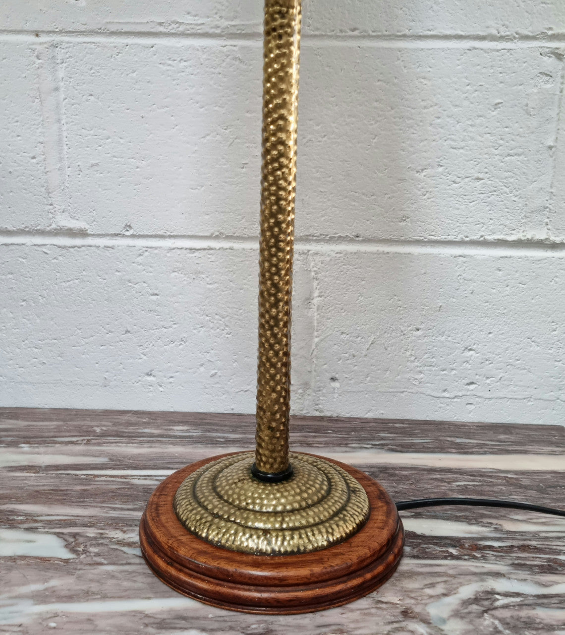 Fabulous Arts and Crafts beaten brass and wooden table lamp. In good working original condition.