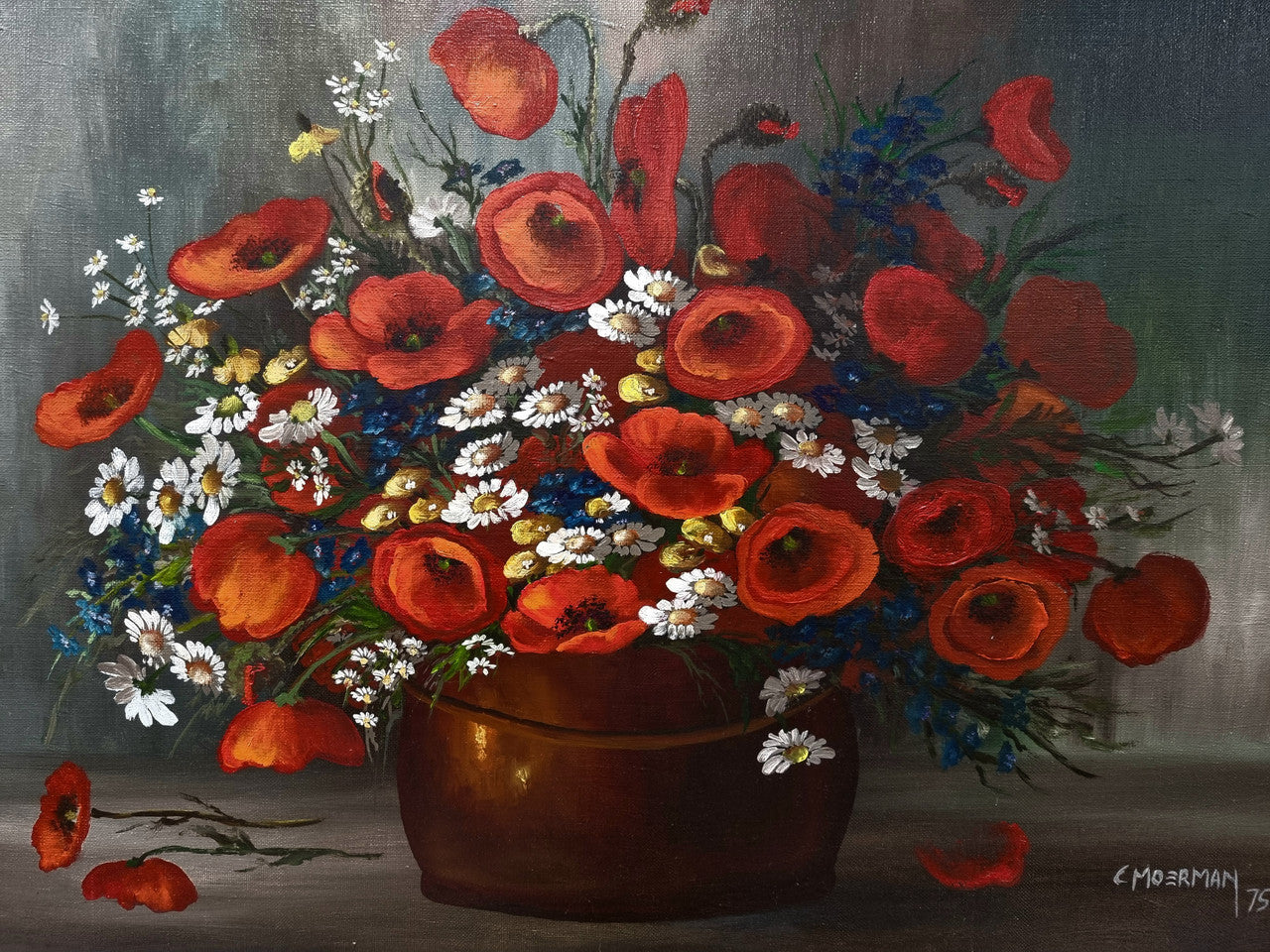 Lovely Vintage signed floral oil on canvas of Poppies and Daisy's and in a decorative gilt frame . In good original detailed condition.