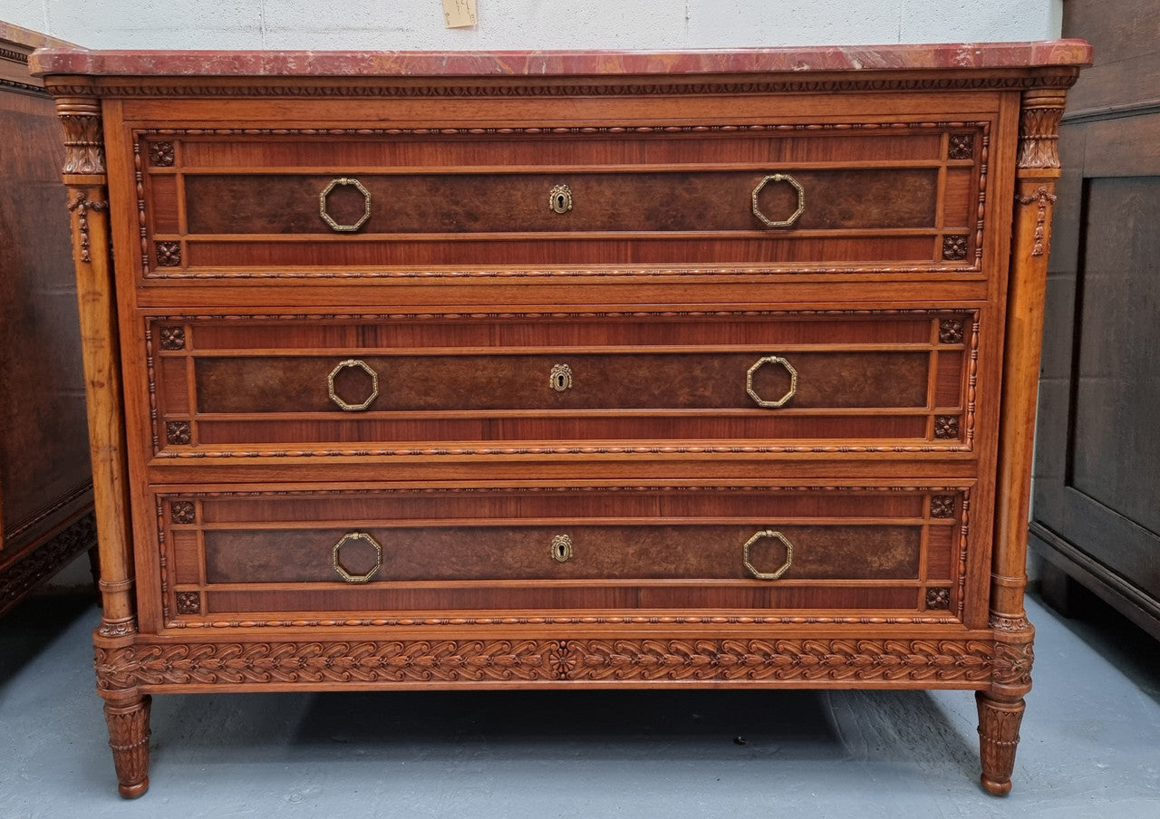 Lovely decorative French walnut and burr Walnut 3 drawer commode with a stunning coloured marble top and lovely carved details. In very good detailed condition.