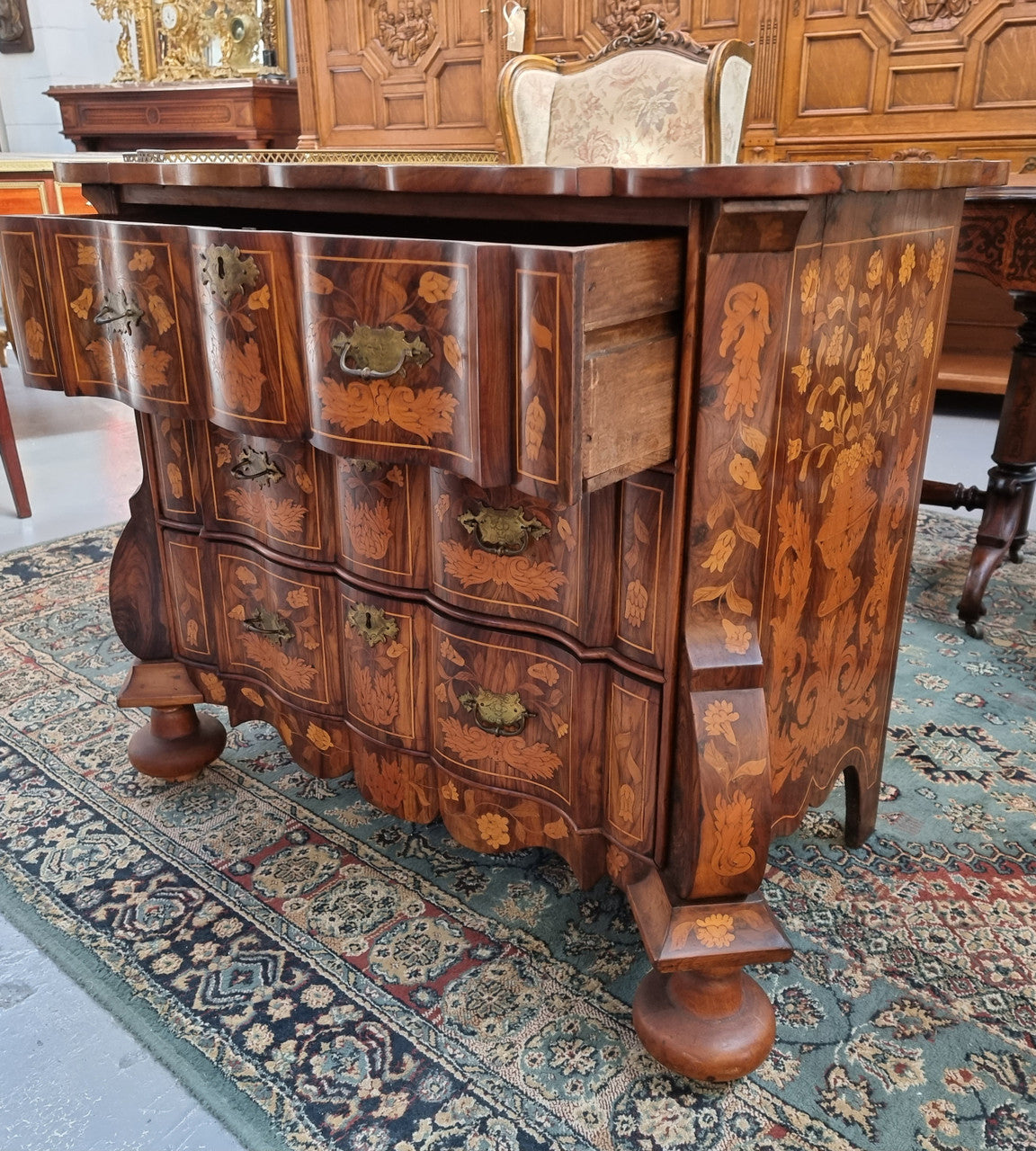 Very Fine highly decorative 18th century Dutch 3 drawer commode. It retains its original brass hardware and Escutcheons. In very good original detailed condition.